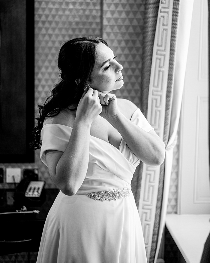 Bride getting ready at Oulton Hall with natural, relaxed morning prep photography.