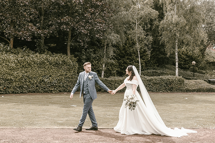 Relaxed couple portraits in the grounds of Oulton Hall.