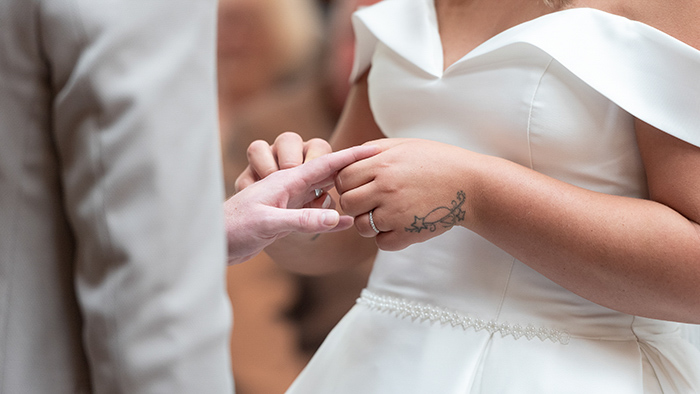 Close‑up of wedding rings at Tankersley Manor.