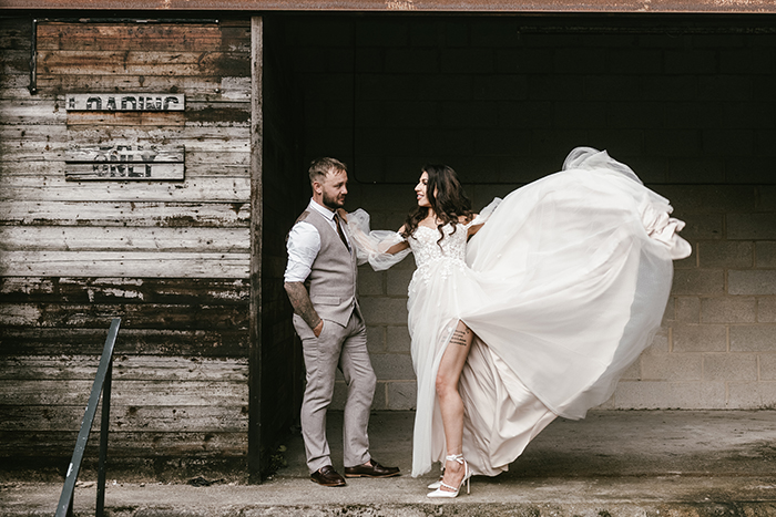 Couple portraits around the mill buildings in Halifax