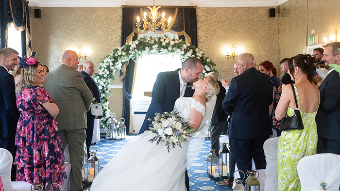 Candid ceremony moments inside Walton Hall