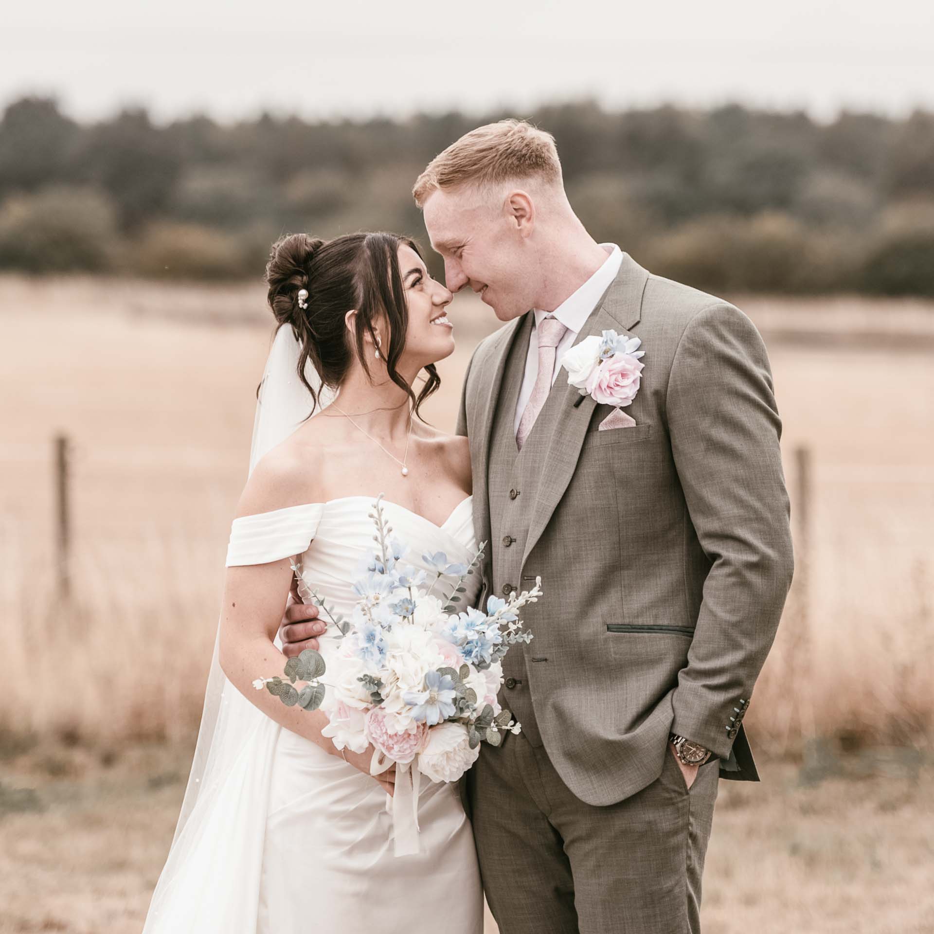 bride and groom in a field in north yorkshire